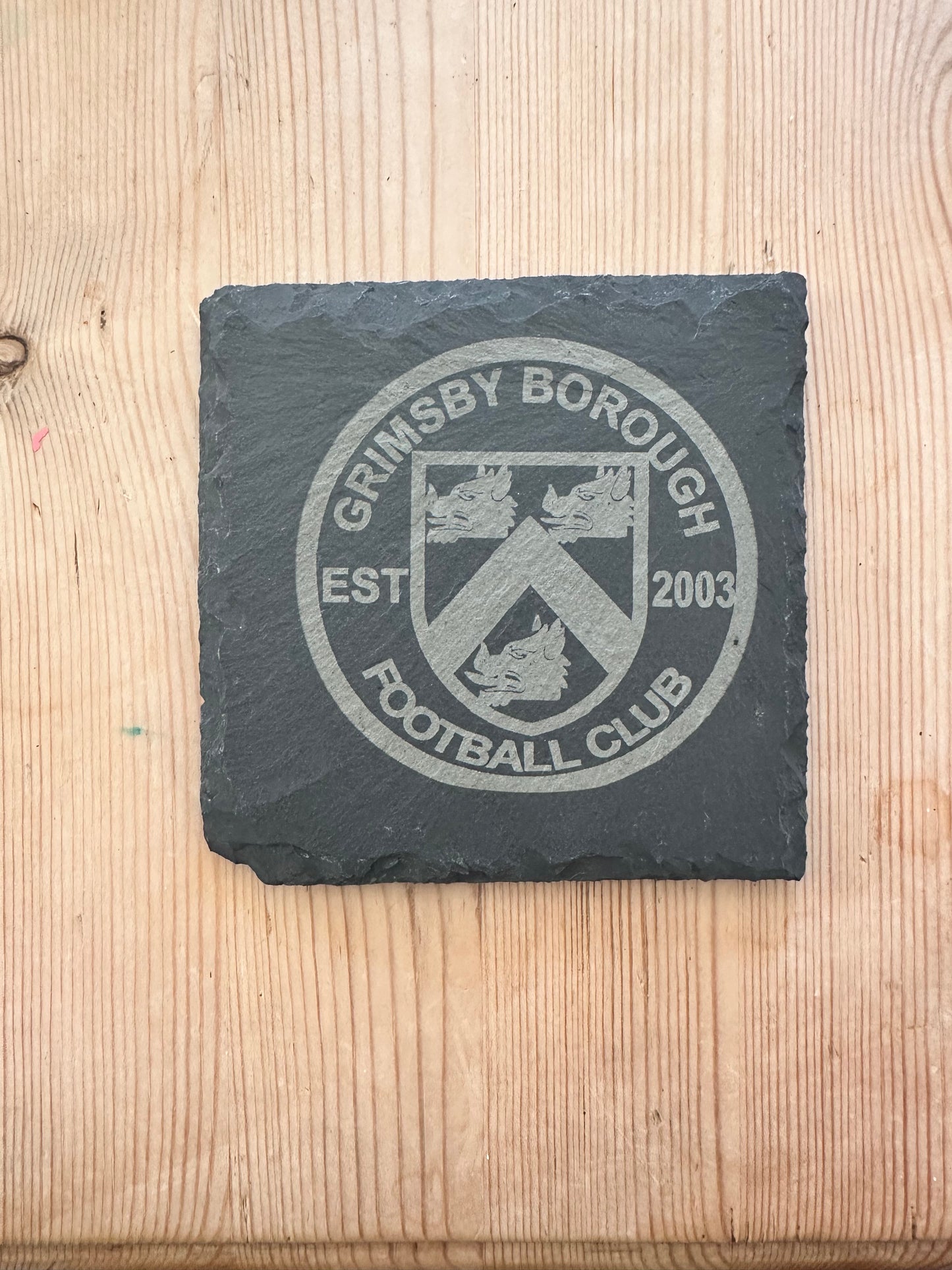 Custom Football badge coaster on Slate